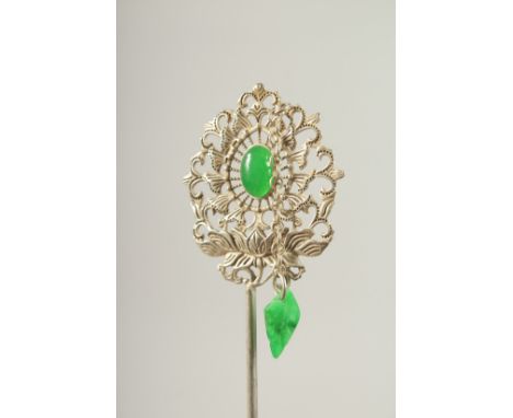 A CHINESE SILVER AND JADE HAIR PIN.