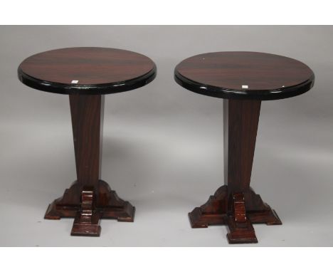 A PAIR OF ART DECO STYLE ROSEWOOD CIRCULAR PEDESTAL TABLES. 73cms high x 59cms diameter.