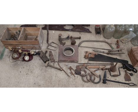 Collection of various to include tools, horseshoes, telephones, crate of bottles