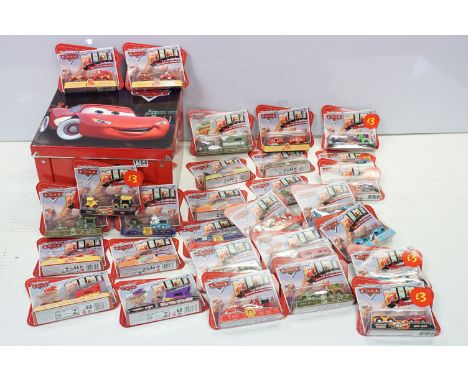 28 Carded Mattel Disney Pixar The World of Cars diecast twin pack models, all ex, contained within a Cars storage box. 