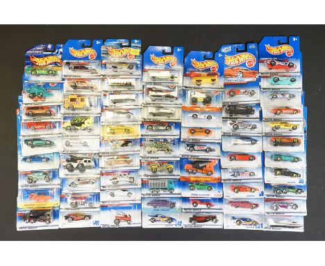 Around 69 carded Mattel Hot Wheels diecast models, appearing vg and some ex 