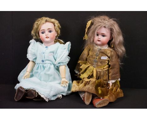 Two late 19th / early 20th Century bisque headed dolls with composite bodies, sleeping eyes, hand painted details, teeth and 