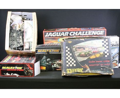 Collection of various Scalextric slot car racing related items to include Ford Escort XR3i, Competition Car Series Set No. CM