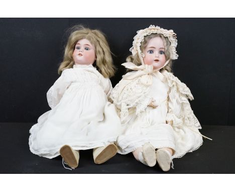 Two early 20th Century bisque headed dolls both with sleeping eyes, teeth and hand painted details. To include one marked for