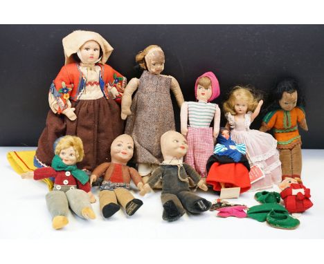 Collection of 11 dolls to include 4 x Norah Wellings cloth doll examples featuring a native American, girl with green bow tie