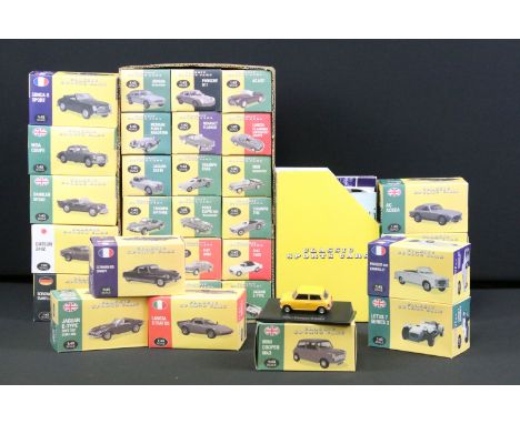 31 Boxed Atlas Editions 1/43 Classic Sports Cars diecast models to include Ford Capri 280, Borgward Isabella, Ac Aceca, Simca