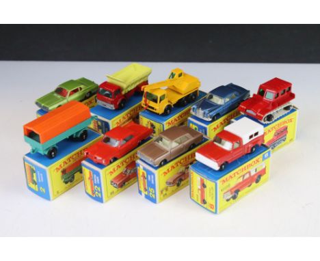 Nine boxed Matchbox 75 Series diecast models to include 70 Grit Spreader Truck, 6 Ford Pick Up, 62 Mercury Cougar, 22 Pontiac