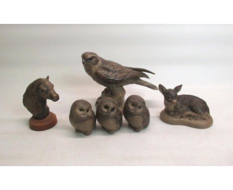 Poole stoneware Falcon perched on rocky outcrop by Barbara Linley-Adams, bearing potters mark and signature to base, H18cm, 3