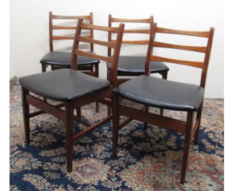 Set of four Vintage teak ladder back dining chairs, with black vinyl seats (4) 