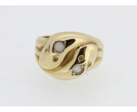 c1970s 9ct gold entwined snake ring, the crowns set with paste stones.  Size Q/R, 5.0g 