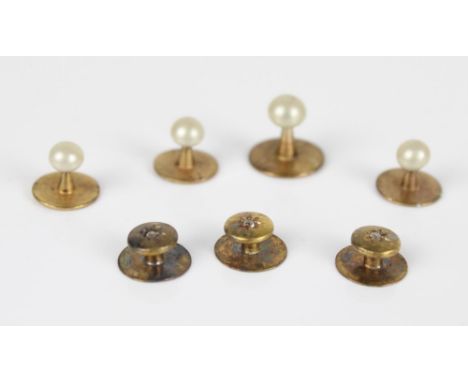 Three Edwardian 15ct gold and chip diamond button studs, 2.0g, together with four other base metal button studs 