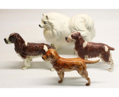 Goebel dogs: Pomeranian, H21cm, two Springer Spaniels, H17cm, and a Golden Retriever 