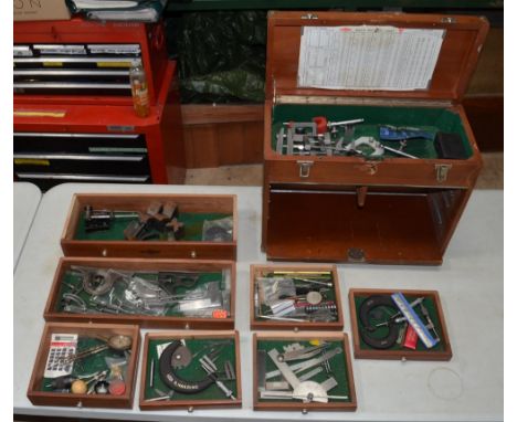 Neslein wooden tool box, 7 drawers and top tray (Lock has been broken). Containing a quantity of tools and precision measurin