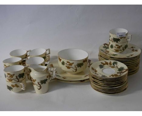 Part 19th century Minton tea set decorated in an aesthetic style comprising 12 cups, saucers, side plates and sugar bowl