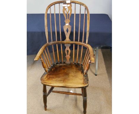 Elm and ash Windsor style stick back chair with turned front legs and H-formed stretcher