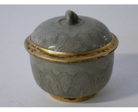 Chinese Longquan type small bowl and cover with gilt rim highlights and a scroll decoration, 8cm high