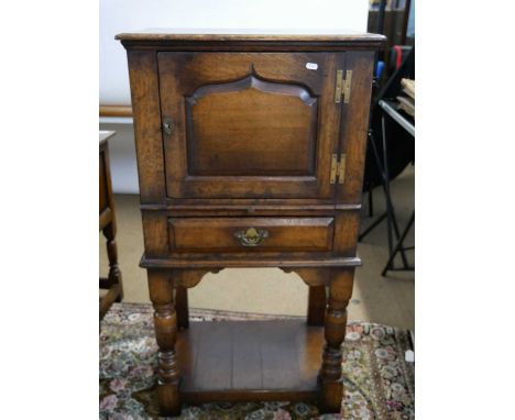 Titchmarsh &amp; Goodwin of Ipswich - Good quality oak drinks cabinet with single panelled door over a single drawer and a ce