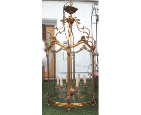 HALL LANTERN, Louis XV style brass of large proportions and cylindrical form with glass panels and six lights, 102cm H x 53cm