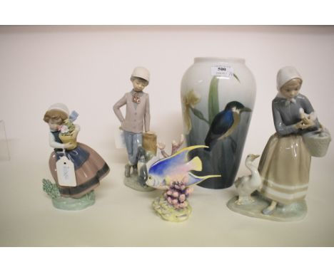 A Royal Worcester fish, Blue Angel, 3574, a German porcelain vase, decorated a kingfisher, 24 cm high, two Lladro figures, an