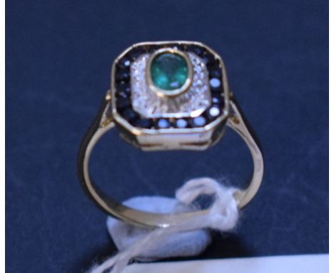 An Art Deco style 9ct gold, emerald, diamond and sapphire ring, approx. ring size N