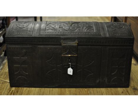An Arts & Craft leather trunk, with tooled decoration, 80 cm wide