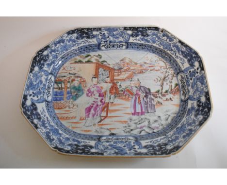 A Chinese export porcelain plate, with underglaze blue decoration, and decorated figures in polychrome enamel, cracked, 41 cm