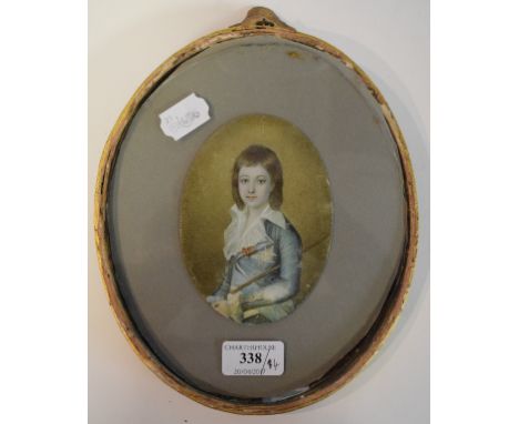 An oval half length portrait miniature, of a young boy, watercolour on ivory, indistinctly signed, 13 x 9.5 cm, and three wat