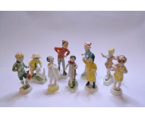 Nine Royal Worcester figures, including Hometime and Skating (9)