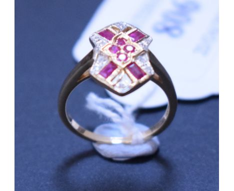 An Art Deco style 9ct gold, ruby and diamond panel ring, approx. ring size N