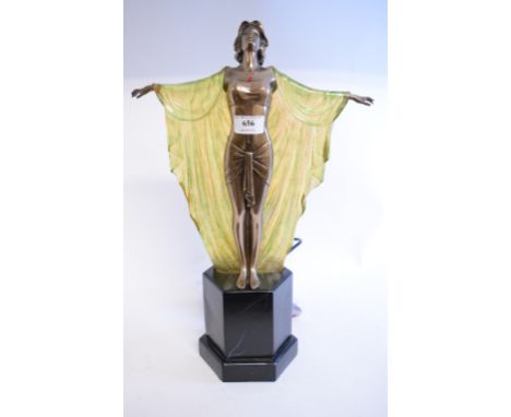 An Art Deco style lamp, in the form of a lady holding a shawl, on a stand, 45 cm high 