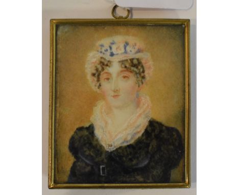 A bust portrait miniature, of a lady wearing a lace collar, watercolour, 7.5 x 6 cm