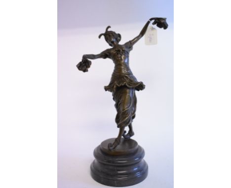 An Art Deco style figure of a dancing lady, on a stand, 37.5 cm high