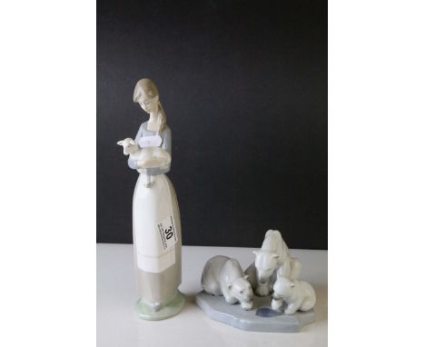 Lladro Figure of a Girl holding a Kid Goat, 27cms high together with a Lladro Model of Polar Bears ' Bearly Love ' model no. 