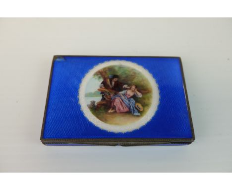 Early 20th century Silver Cigarette Case, with blue guilloche enamelled hinged lid and sides, the lid decorated with a classi