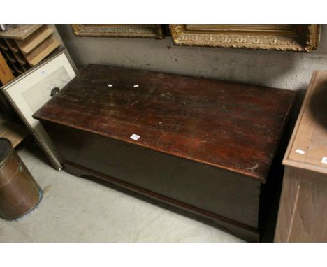 19th century Stained Pine Blanket Box, the hinged lid opening to reveal a candle tray, raised on bracket feet, 126cms long x 