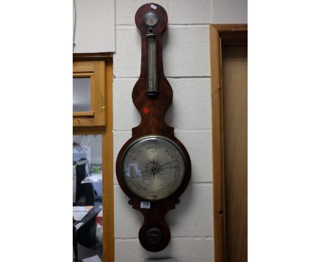 An early 19th century mahogany  Fagioli &amp; Sons banjo wheel barometer.