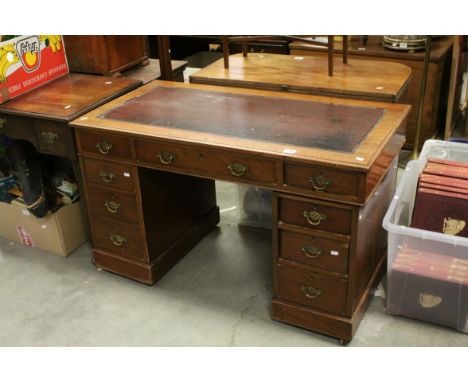 Victorian Mahogany Twin Pedestal Desk with leather inset top and an arrangement of nine drawers, 116cms long x 72cms high