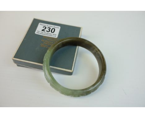 Spinach Jade Bangle with carved design to outer rim, 9cms diameter