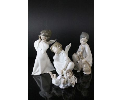 Four Lladro Figures including ' Shh Quiet Puppy ' model no. 4522 and Three Angel Figures