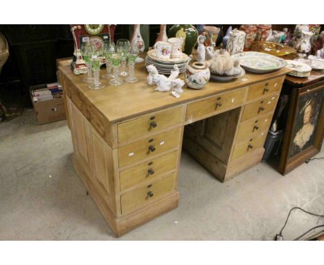 Victorian Pine Twin Pedestal Desk over an arrangement of nine drawers, 134cms long x 71cms deep x 82cms high