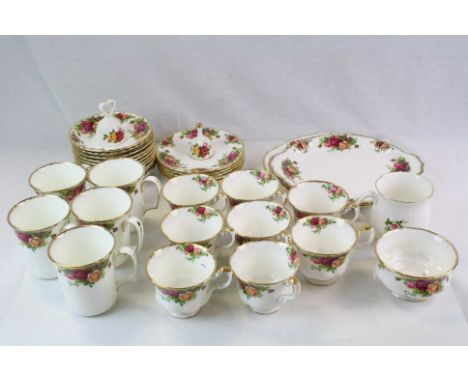 A  quantity of Royal Albert Country Roses to include cups and saucers sugar bowl side plates etc.