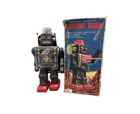 Battery operated fighting robot with original box, seems to be in full working order. Made in Japan 