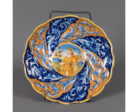 Deruta Ceramic Tazza, on central foot. With waived decorations. Painted in multicolours with ornaments in the centre lady in 