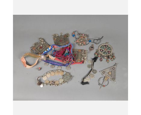 Lot of Oriental Jewellery, silver work with textile, coins, filigree work, enamel and corals, different size and age