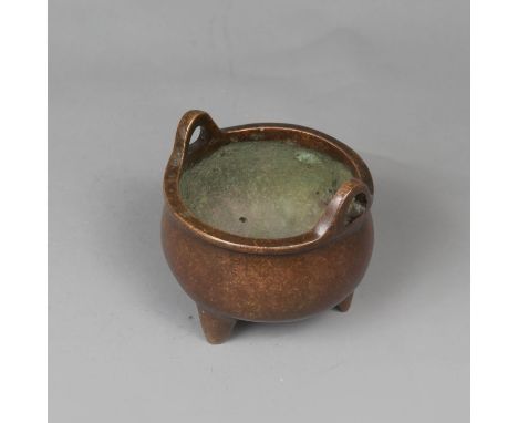 Chinese Bronze Bowl, original cast with three legs and bottom mark in the cast, two eyelets, original patina, 9,5 cm high, 10