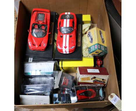 12x 1:18 scale cars by Maisto, Revell, Ertl, etc. Including; Ferrari 250 Testa Rossa. Aston Martin DB7 Vantage. Mercedes CLK-