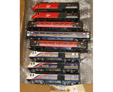 A quantity of unboxed Hornby Railways OO gauge railway. 2 First Great Western Class 43 power cars and unpowered cars, NR43029