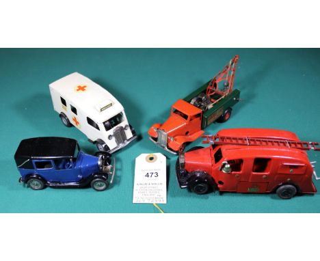 4 Tri-ang clockwork vehicles. Post War Breakdown Lorry, standard cab example (48M). Cab in red with dark green body, red jib,