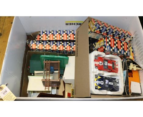 A quantity of Scalextric. Including 5x racing cars including; 2x Ford GT40, 2x March Ford 240 and a Lotus. Trackside Accessor