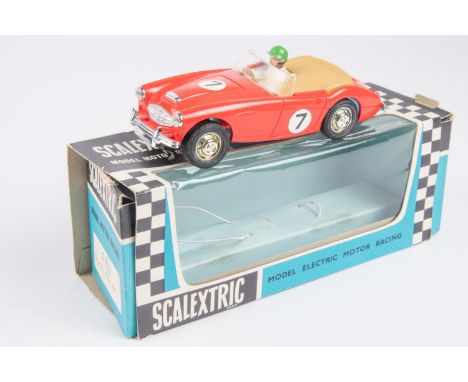 Tri-ang Scalextric (C74) Austin Healey 3000, racing number 7, with red body. Boxed, in window box and re-tied into blue inner